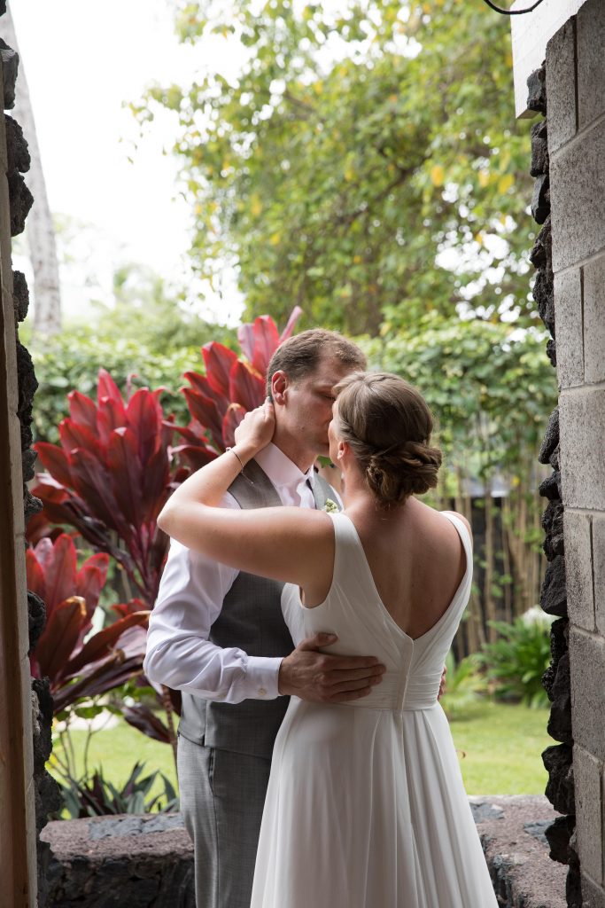 bride and groom share private moment after ceremony