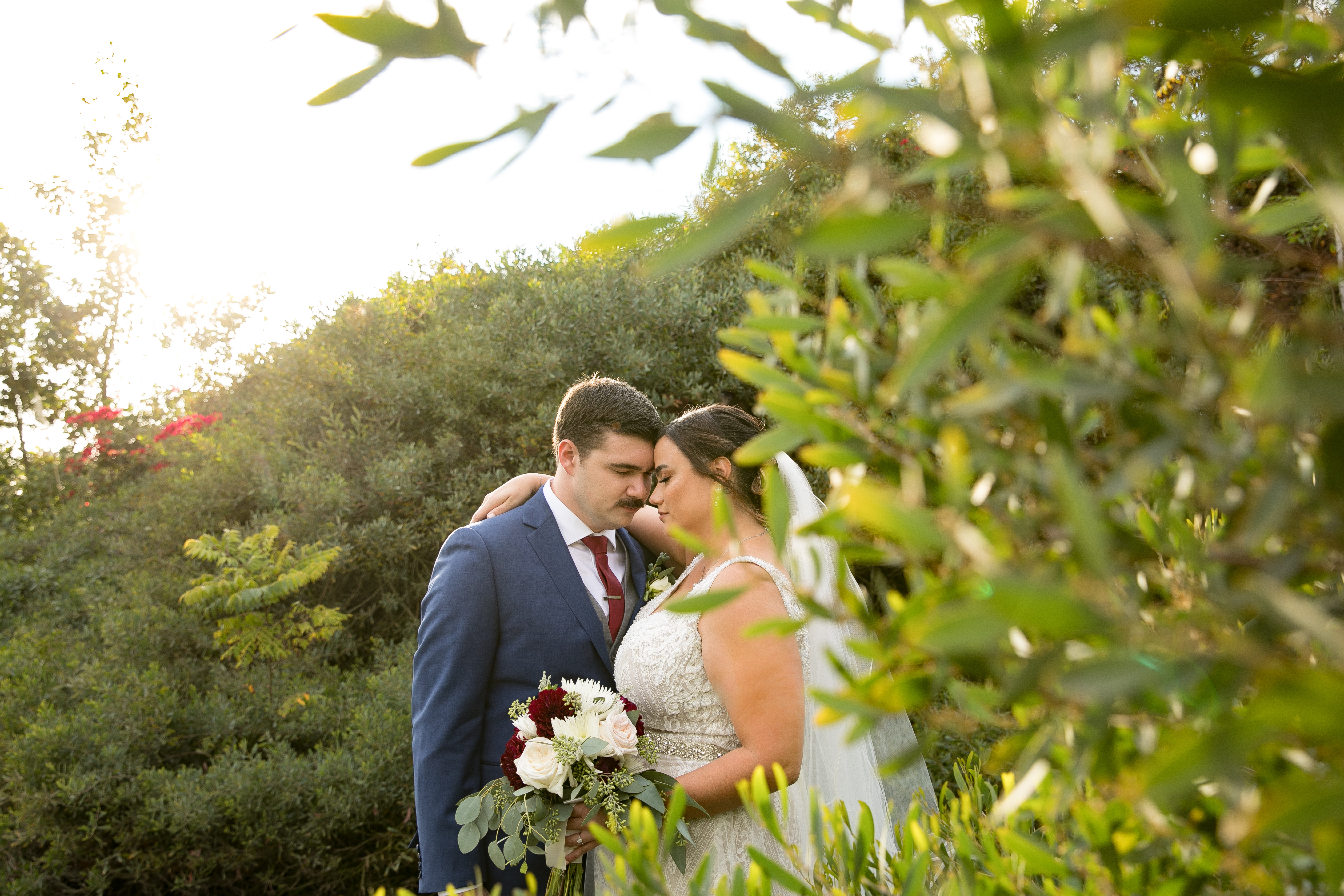 bride and groom embrace after wedding ceremony