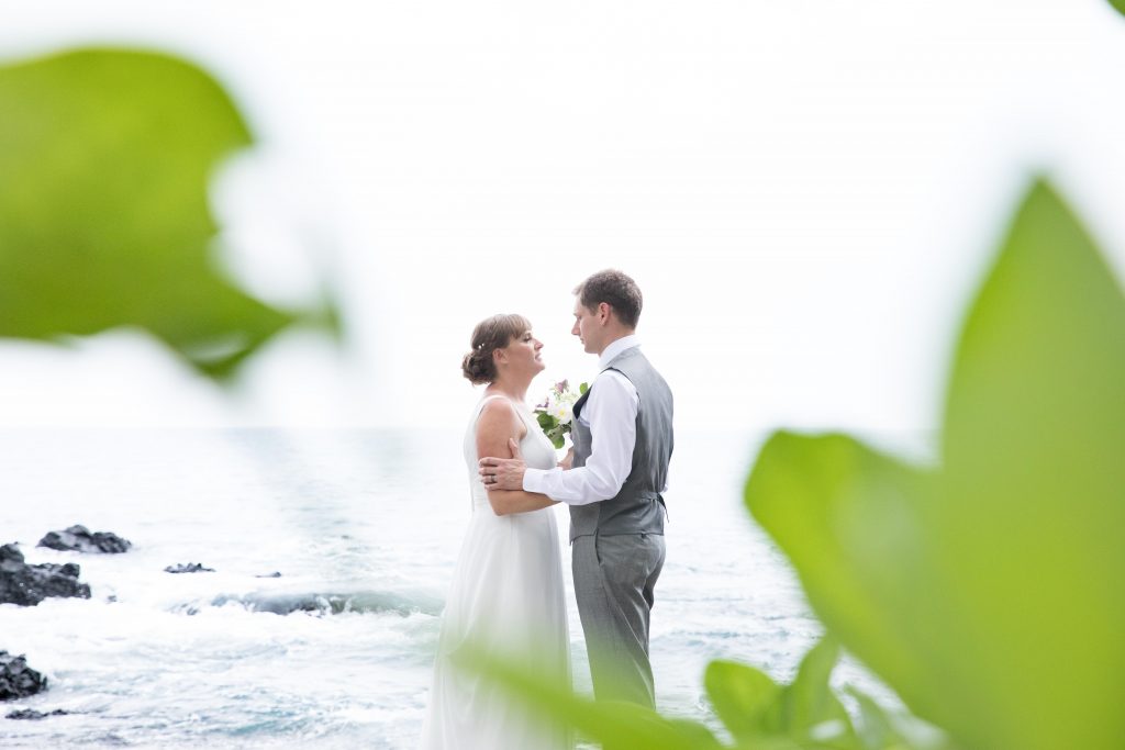 bride and groom almost kiss Kealakekua Bay Wedding Venue