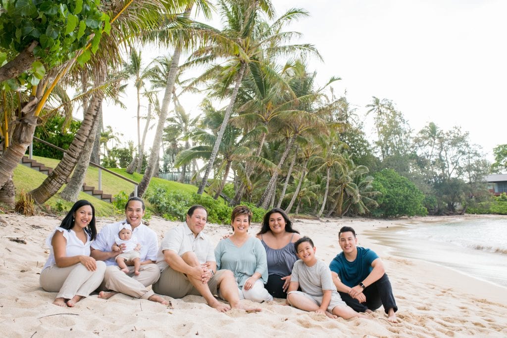 family sit on beach photography hawaii