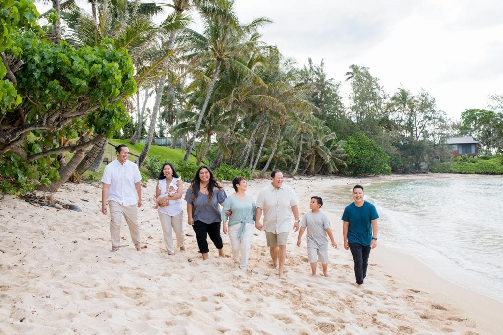 family walks on beach